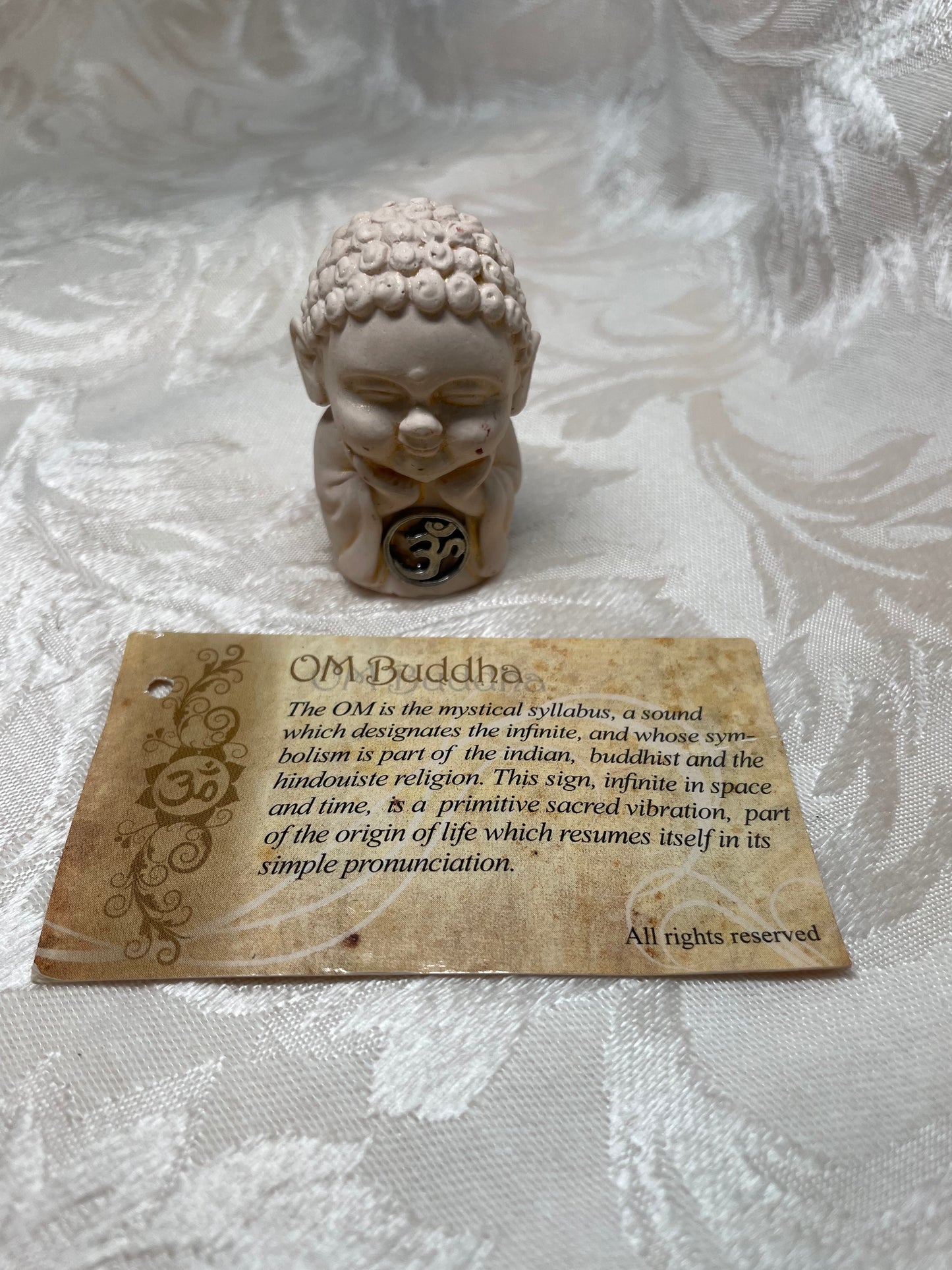 OM Buddha Statue
