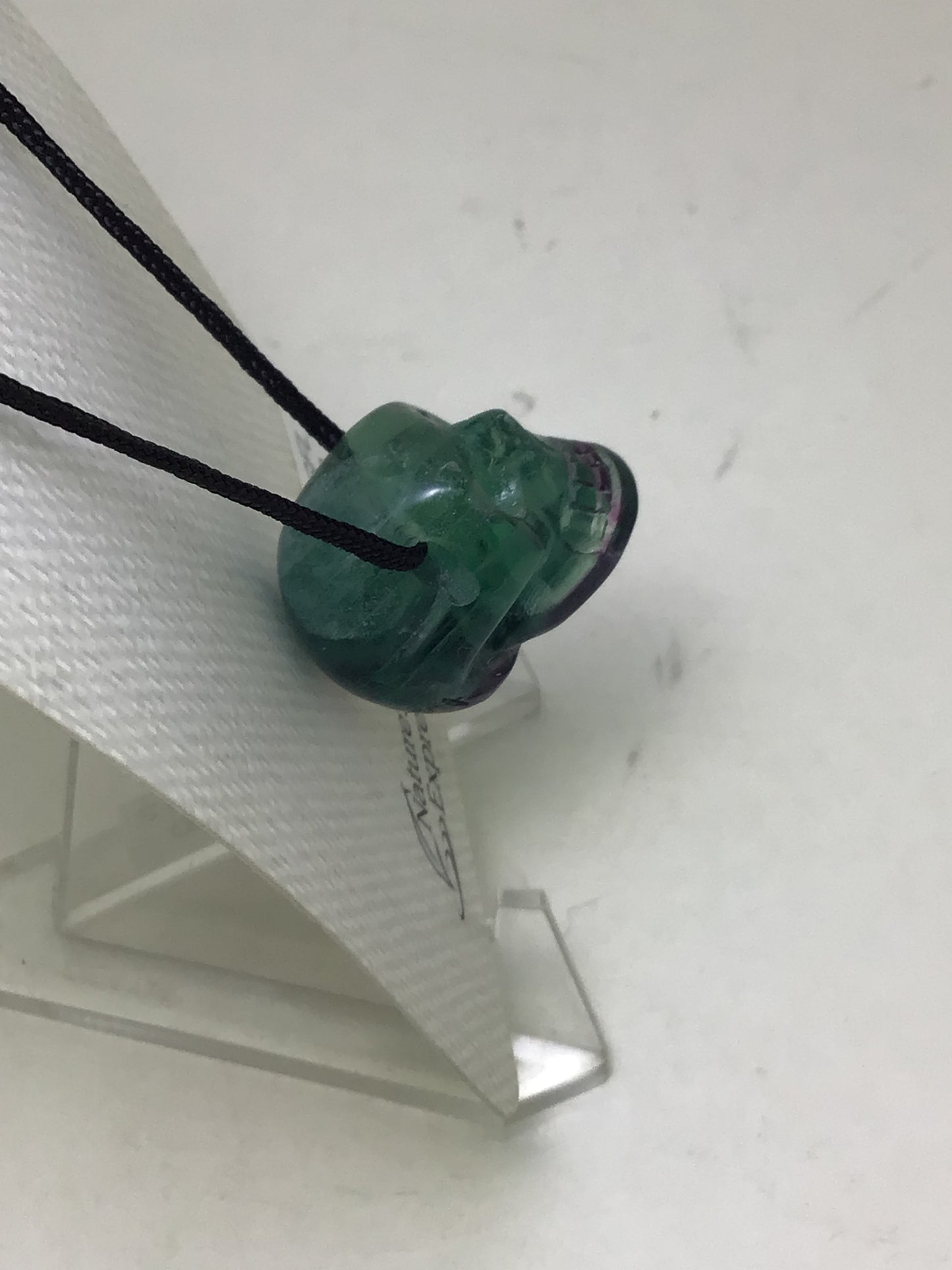Fluorite Skull Pendant on Black Cord