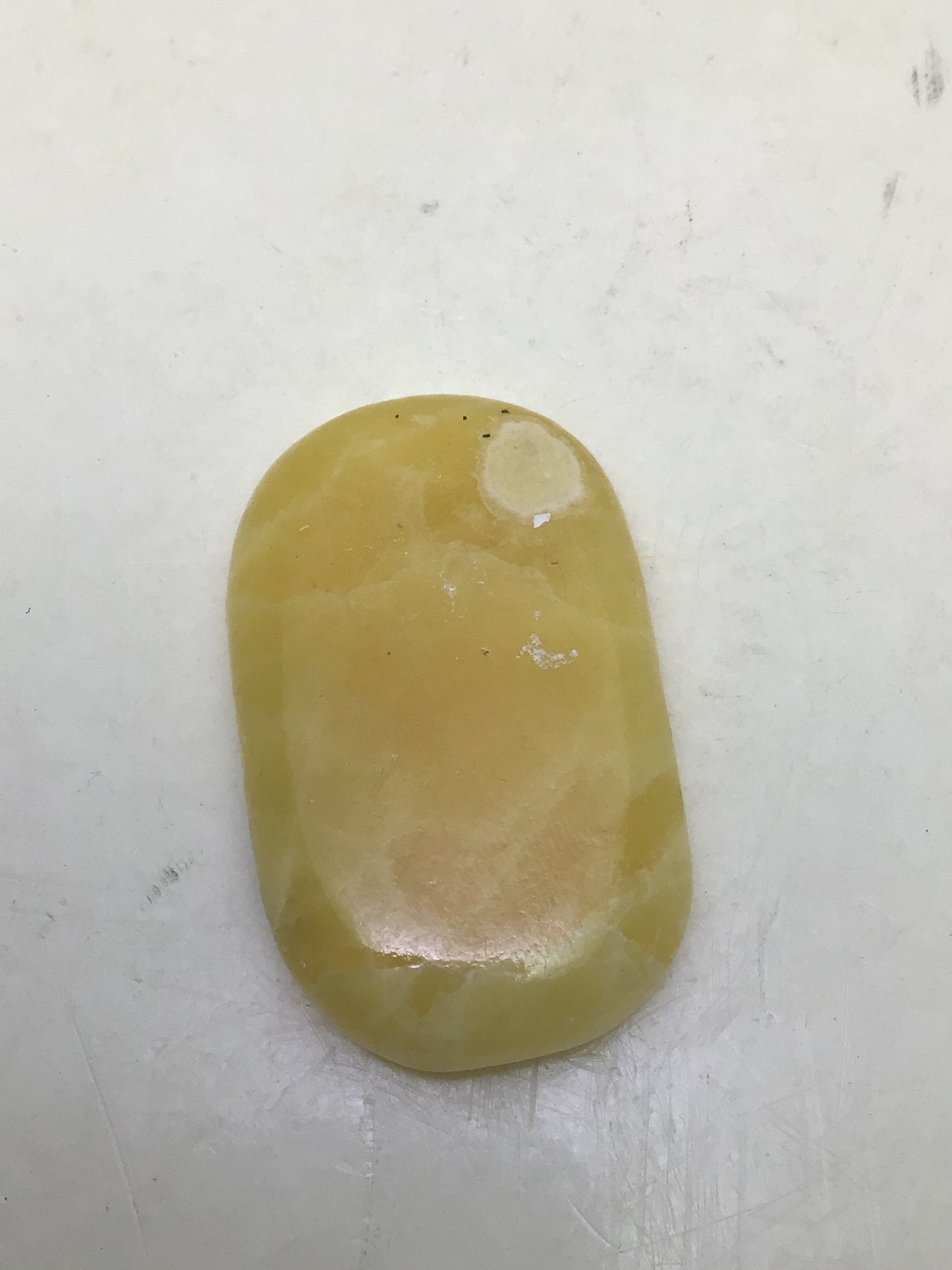 Orange Calcite Thumb Stone
