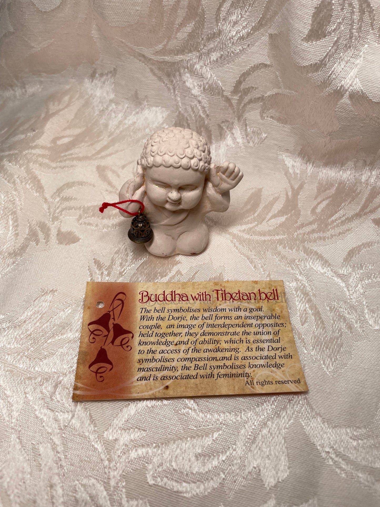 Buddha with Tibetan Bell Statue